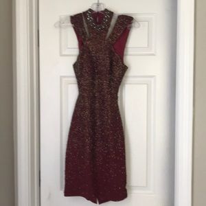 Sleeveless maroon dress with beading